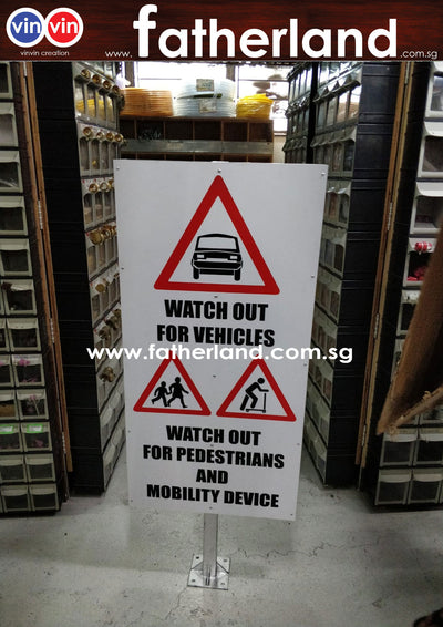 WATCH OUT FOR VEHICLES PEDESTRIANS AND MOBILITY DEVICE